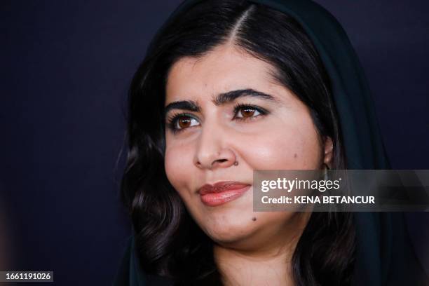 Pakistani education activist Malala Yousafzai arrives for the Kering Foundation's second annual Caring for Women Dinner at The Pool in New York City...