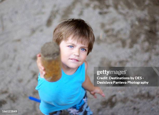 little boy holding wooden block - wood block instrument stock pictures, royalty-free photos & images