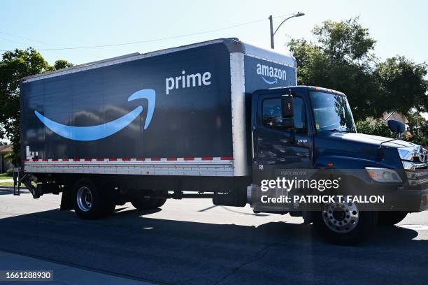 Box truck displaying the Amazon Prime logo drives through a neighborhood in Torrance, California on September 12, 2023.