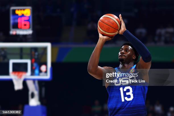 Jaren Jackson Jr. #13 of the United States attempts a three-pointer in the second quarter during the FIBA Basketball World Cup quarterfinal game...