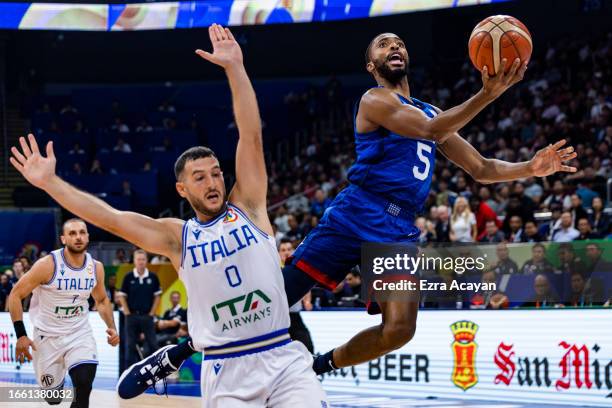 Mikal Bridges of the United States goes for the basket against Marco Spissu of Italy during the FIBA Basketball World Cup quarter final game between...