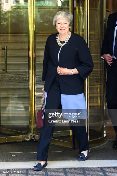 Former British Prime Minister Theresa May is seen as she leaves Millbank Studios on September 05, 2023 in London, England. A portrait by Saied Dai of...