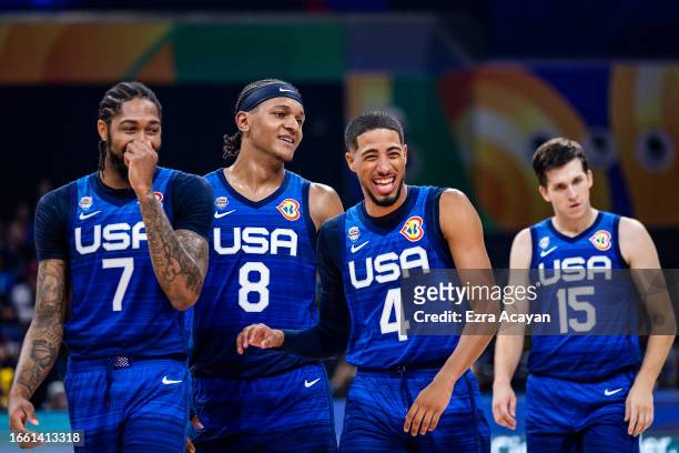 Brandon Ingram, Paolo Banchero, Tyrese Haliburton, and Austin Reaves of the United States walk on court during the FIBA Basketball World Cup quarter...