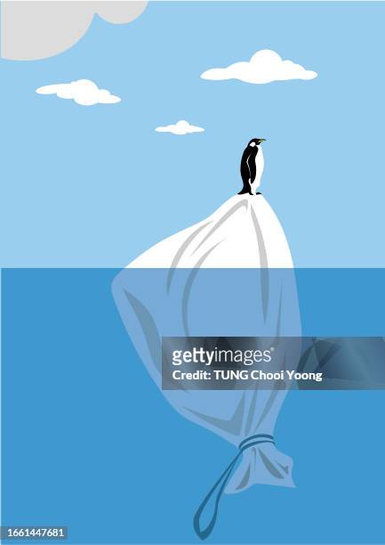 penguin standing on plastic bag. - water damage stock illustrations