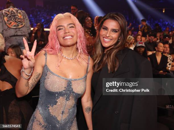 Karol G and Nelly Furtado at the 2023 MTV Video Music Awards held at Prudential Center on September 12, 2023 in Newark, New Jersey.