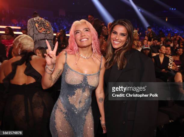 Karol G and Nelly Furtado at the 2023 MTV Video Music Awards held at Prudential Center on September 12, 2023 in Newark, New Jersey.