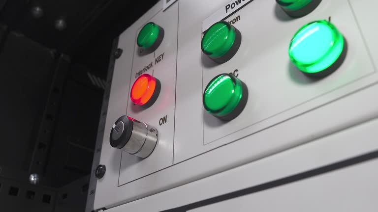 Red Control Panel Button Metal control panel with many lights red button for turning on and ...