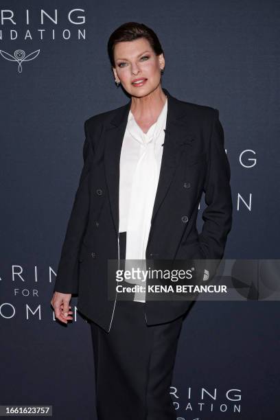 Canadian model Linda Evangelista arrives for the Kering Foundation's second annual Caring for Women Dinner at The Pool in New York City on September...