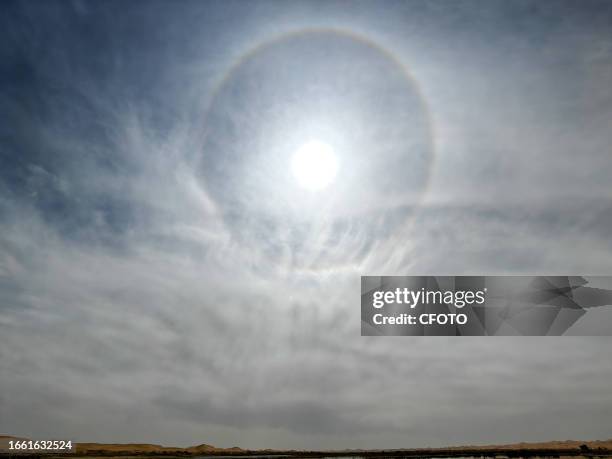 Solar halo appears over the Ulan Lake in the Tengger Desert, known as the heart of the Earth, in Yinchuan, Ningxia province, China, September 10,...