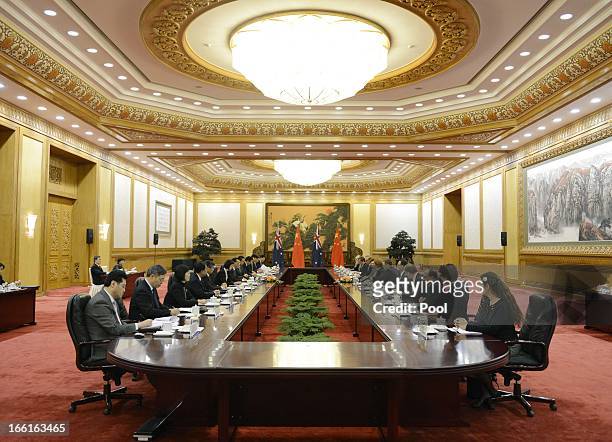 Chinese Premier Li Keqiang speaks with Australia Prime Minister Julia Gillard during a meeting at the Great Hall of the People on April 9, 2013 in...