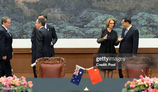 Australian Prime Minister Julia Gillard talks with Chinese Premier Li Keqiang during a meeting at the Great Hall of the People on April 9, 2013 in...