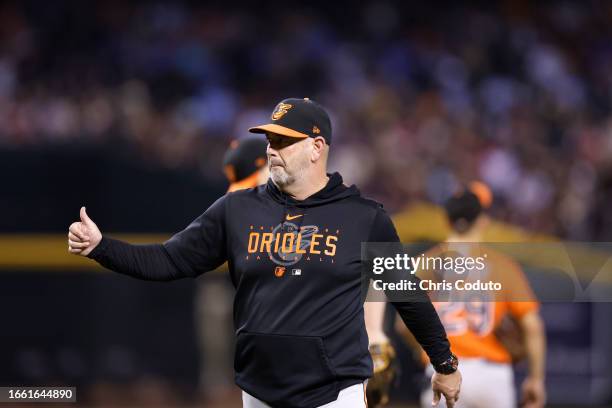 Manager Brandon Hyde of the Baltimore Orioles gestures during the game against the Arizona Diamondbacks at Chase Field on September 02, 2023 in...