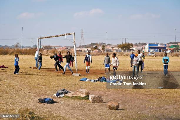 The day before the start of the 2010 FIFA World Cup, children playing football near their homes in the township of Jabulani, Soweto on June 10th...