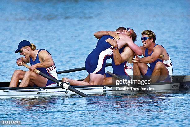 Sir Steve Redgrave is hugged by team-mate Matthew Pinsent after the GB crew won the gold medal in the Olympic mens coxless four final at Penrith...