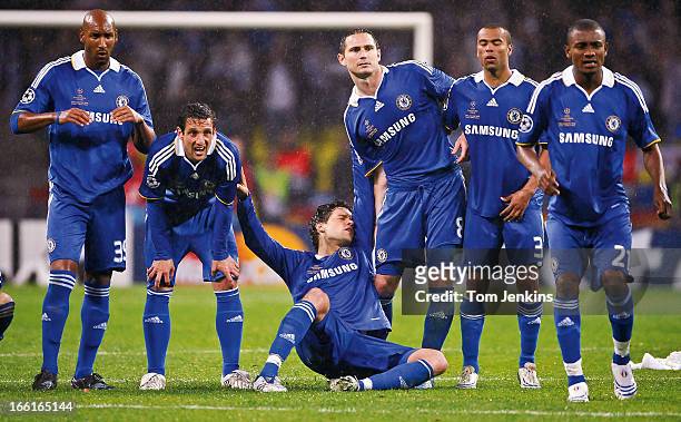 The Chelsea team, Including German player Michael Ballack , react as John Terry misses what would have been the winning penalty in the shoot-out...