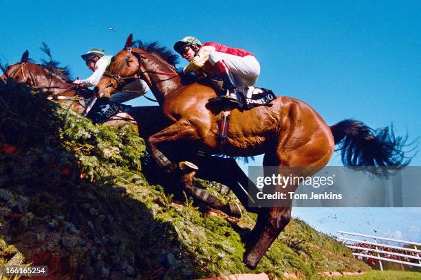 Bobbyjo , ridden by Paul Carberry, jump the Canal Turn fence on their way to winning the 1999 Grand National steeplechase at Aintree racecourse on...