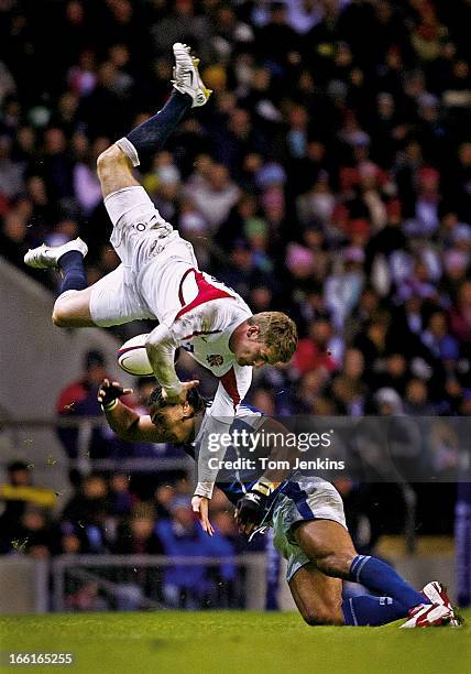 Mark Cueto of England is upended by Alesana Tuilagi of Samoa during the England v Samoa international rugby union match at Twickenham Stadium on...