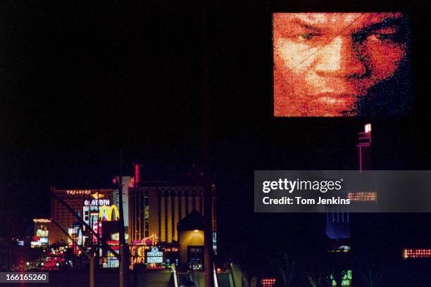 An image of the American boxer Mike Tyson appears on a big screen above the hotels and casinos of Las Vegas the day before his world heavyweight...