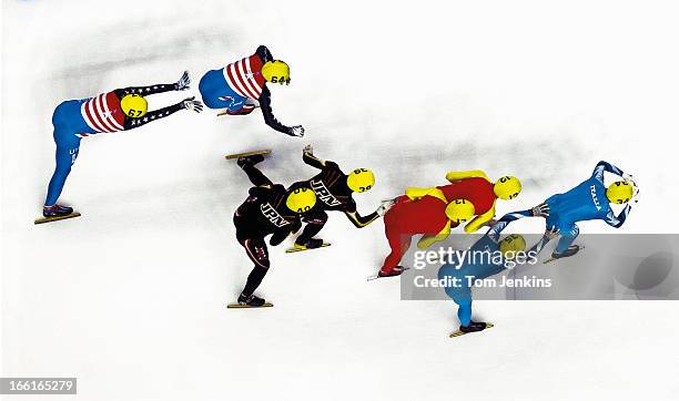 Change-over during the men's 5000m relay final shows the teams USA, Japan, China and Italy during the World Short Track Speed Skating Championships...