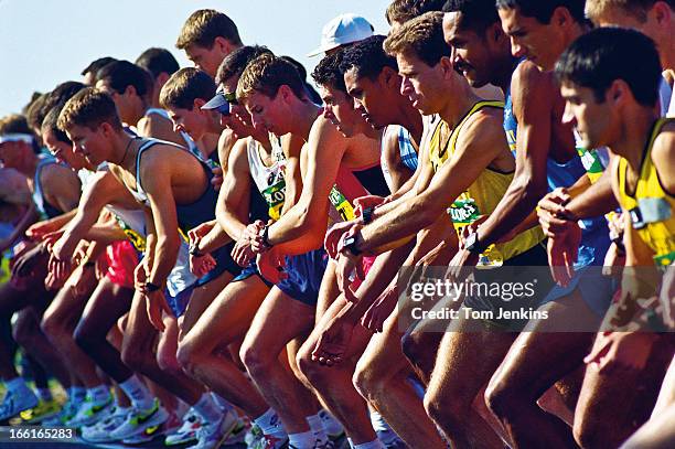 Elite runners start their watches as they begin the 1997 London Marathon at Blackheath on April 13th 1997 in London . An image from the book "In The...