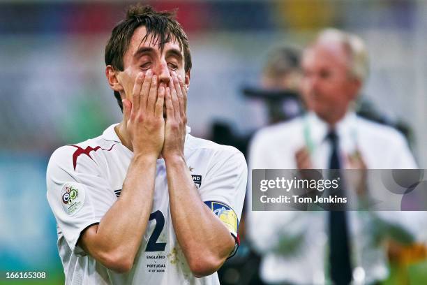 Gary Neville of England shows despair after his team exited the 2006 FIFA World Cup at the quarter-final stage to Portugal on penalties in...