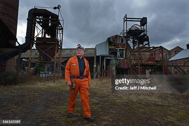 John Kane, former miner and tour guide at the National Mining Museum Scotland, stands near pithead on April 9, 2013 in Newtongrange, Scotland....