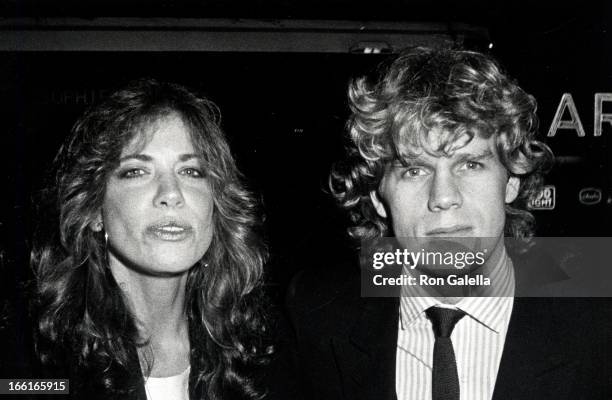 Singer Carly Simon and actor Al Corley attending the party for "Sophie's Choice" on December 5, 1982 at the Atrium in New York City, New York.