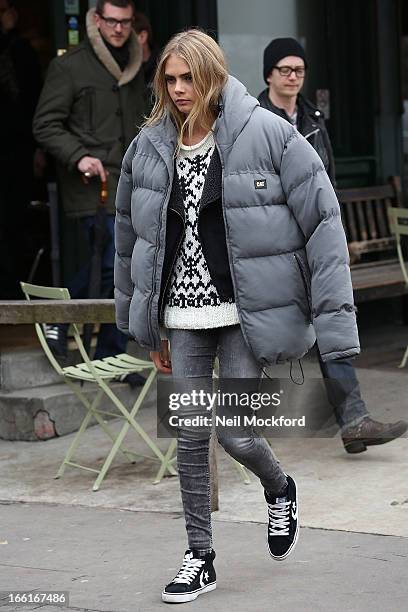 Cara Delevingne seen on a PEPE Jeans photoshoot at The Westbourne Pub in Notting hill on April 9, 2013 in London, England.