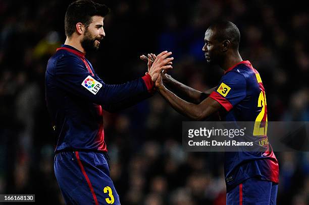 Eric Abidal of FC Barcelona comes on for Gerard Pique of FC Barcelona during the La Liga match between FC Barcelona and RCD Mallorca at Camp Nou on...