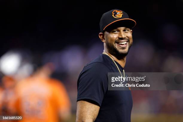 Aaron Hicks of the Baltimore Orioles smiles after the Orioles defeated the Arizona Diamondbacks by 7-3 at Chase Field on September 02, 2023 in...