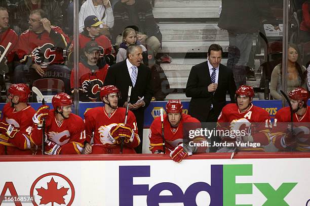 Head Coach Bob Hartley and Assistand Coach Martin Gelinas of the Calgary Flames at Scotiabank Saddledome on April 3, 2013 in Calgary, Canada.