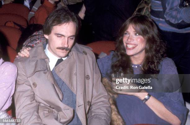 Musicians James Taylor and Carly Simon attend the "Pumping Iron" New York City Premiere on January 17, 1977 in New York City, New York.