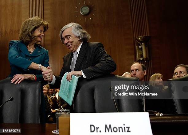 Secretary of Energy nominee Ernest Moniz confers with ranking committee member Sen. Lisa Murkowski prior to his testimony before the Senate Energy...