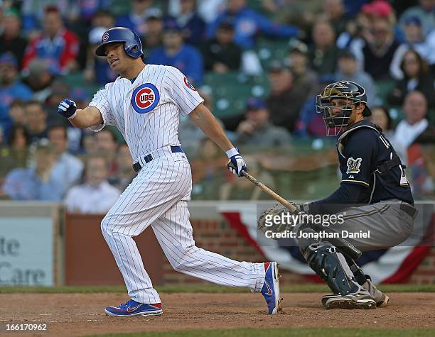 Scott Hairston of the Chicago Cubs bats against the Milwaukee Brewers during the Opening Day game at Wrigley Field on April 8, 2013 in Chicago,...