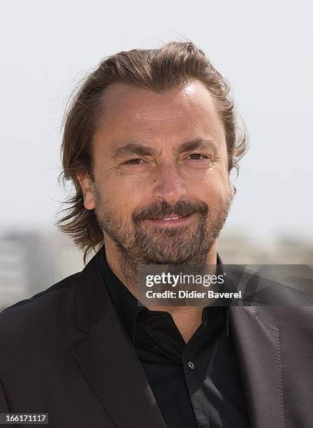Ex-tennis player Henri Leconte poses during a photocall for the TV Series 'Looking For' at MIP TV 2013 on April 9, 2013 in Cannes, France.