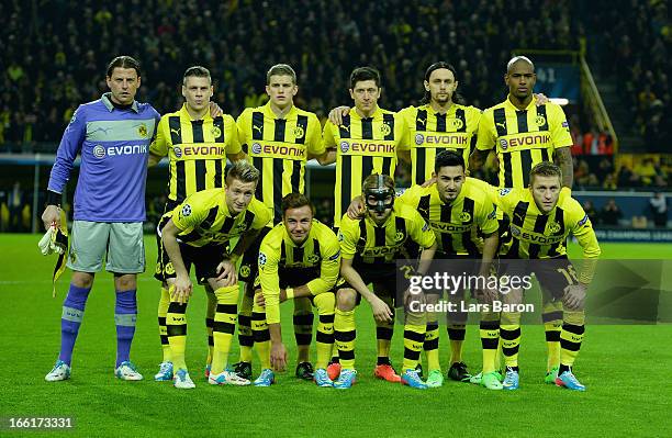 The Borussia Dortmund team line up ahead of the UEFA Champions League quarter-final second leg match between Borussia Dortmund and Malaga at Signal...