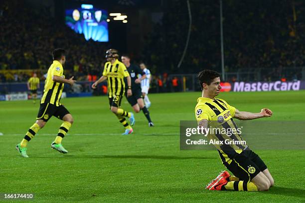 Robert Lewandowski of Borussia Dortmund celebrates scoring their first goal during the UEFA Champions League quarter-final second leg match between...