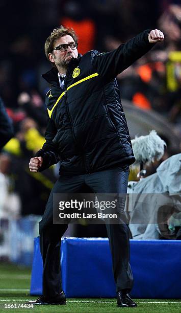 Head coach Juergen Klopp of Dortmund celebrates after Robert Lewandowski scored his teams first goal during the UEFA Champions League Quarter Final...