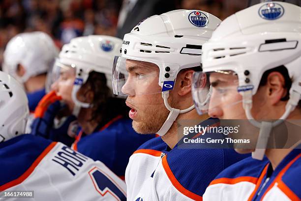 Nail Yakupov of the Edmonton Oilers sits on the bench against the Calgary Flames on April 3, 2013 at the Scotiabank Saddledome in Calgary, Alberta,...