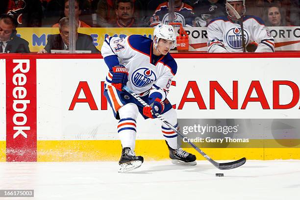 Nail Yakupov of the Edmonton Oilers skates against the Calgary Flames on April 3, 2013 at the Scotiabank Saddledome in Calgary, Alberta, Canada. The...