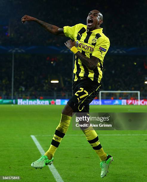 Felipe Santana of Borussia Dortmund celebrates scoring their third and winning goal during the UEFA Champions League quarter-final second leg match...