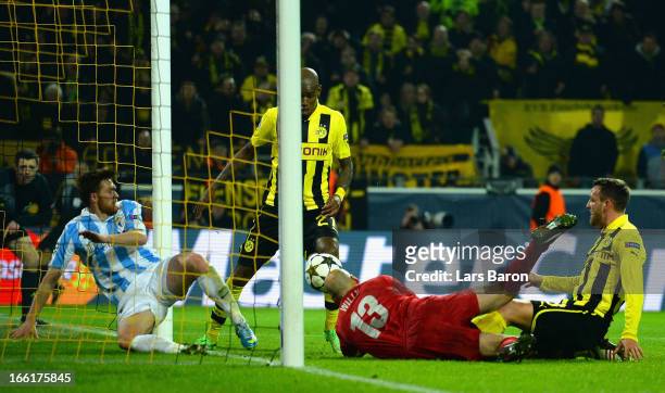 Felipe Santana of Borussia Dortmund scores their third and winning goal during the UEFA Champions League quarter-final second leg match between...
