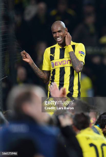 Felipe Santana of Borussia Dortmund celebrates victory after scoring the third and winning goal that puts his team into the semi-finals during the...