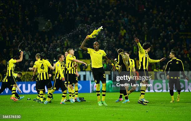 Felipe Santana of Borussia Dortmund celebrates victory and a place in the semi-finals with his tea mamtes during the UEFA Champions League...