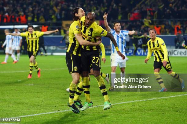 Felipe Santana of Borussia Dortmund celebrates scoring their third and winning goal with team mates Neven Subotic during the UEFA Champions League...