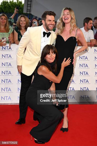 Joel Dommett, Davina McCall and Hannah Cooper attend the National Television Awards 2023 at The O2 Arena on September 05, 2023 in London, England.