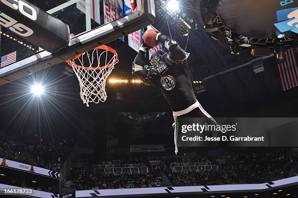 The Brooklyn Knight goes up for a dunk before second quarter in the game between the Philadelphia 76ers and the Brooklyn Nets on April 9, 2013 at the...