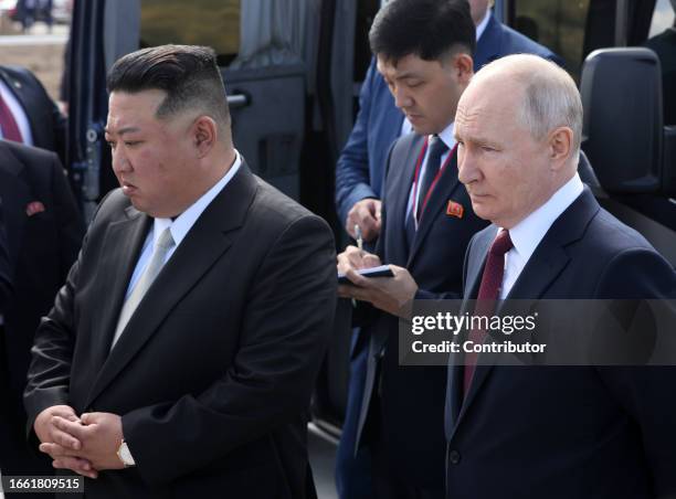 Russian President Vladimir Putin and North Korean leader Kim Jong-un visit a construction site of the Angara rocket launch complex on September 13,...
