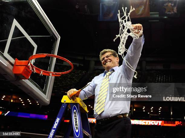 Head coach Geno Auriemma of the Connecticut Huskies cuts down the net after defeating the Louisville Cardinals during the 2013 NCAA Women's Final...