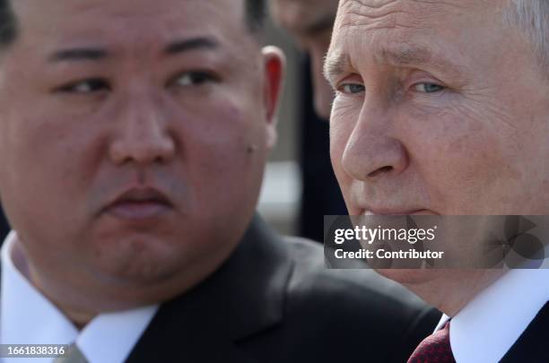 Russian President Vladimir Putin and North Korean leader Kim Jong-un visit a construction site of the Angara rocket launch complex on September 13,...